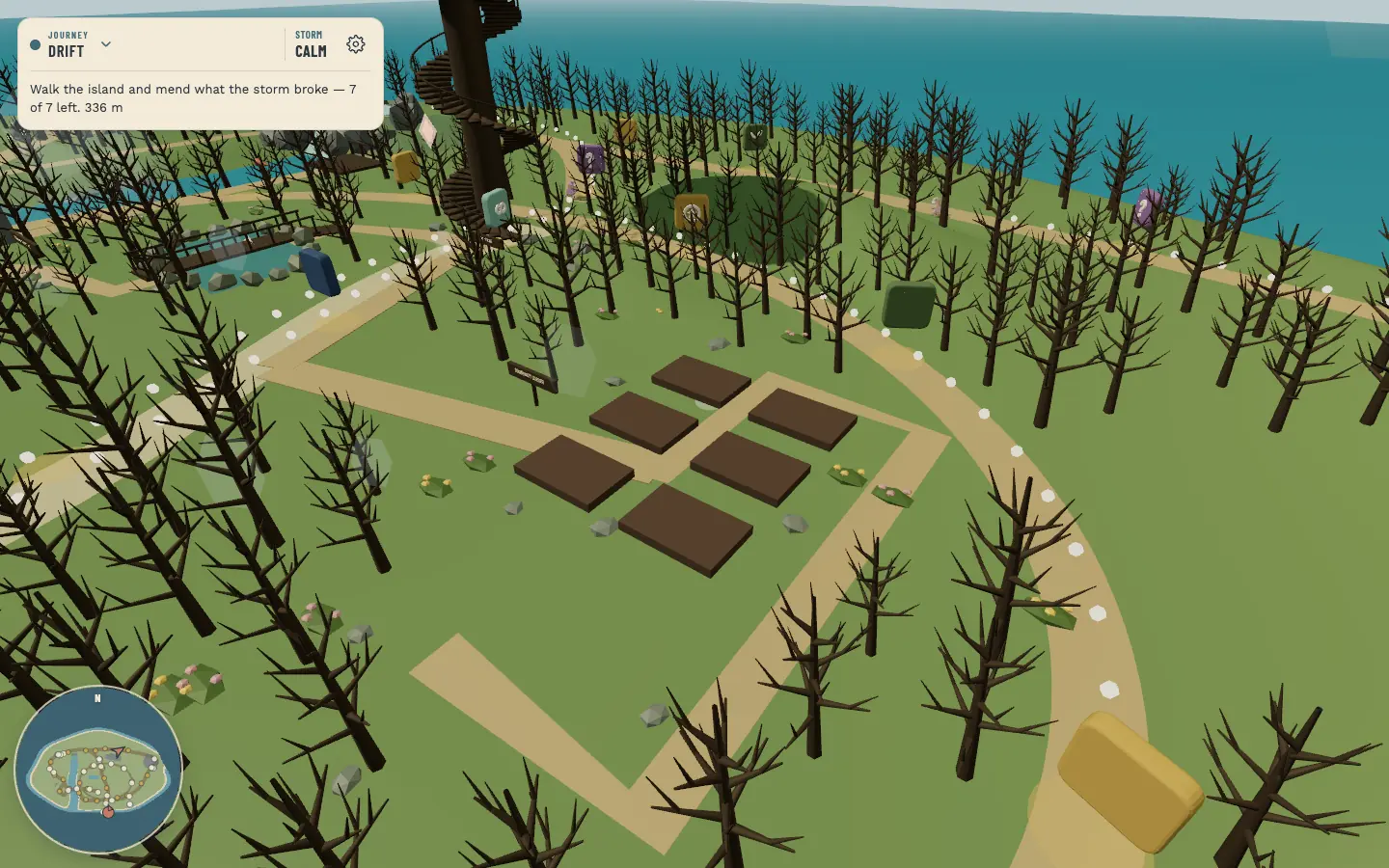 The community garden after a storm, beds bare and trees stripped.